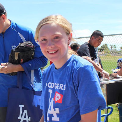 young girl at baseball clinic